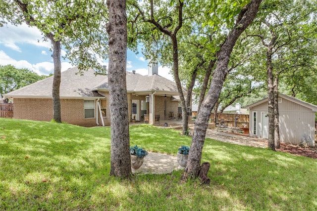 exterior space with a patio and a yard