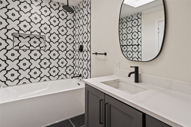 bathroom with tile patterned floors and vanity