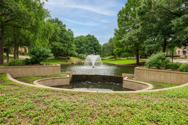 view of home's community featuring a water view