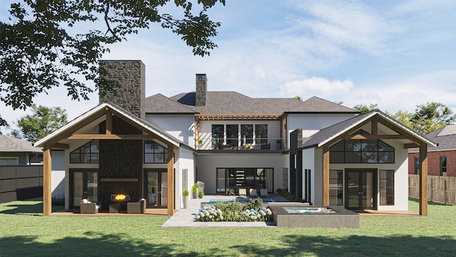 rear view of house with a patio area, a lawn, a fire pit, and a balcony