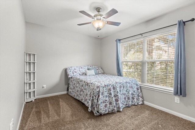 bedroom featuring hardwood / wood-style floors and ceiling fan