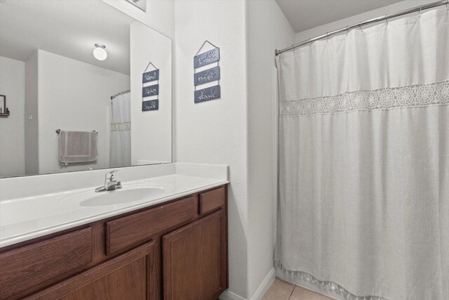 bathroom with toilet and tile patterned floors