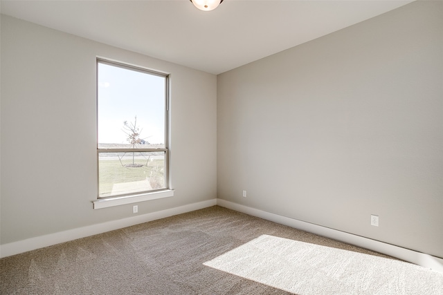 view of carpeted spare room