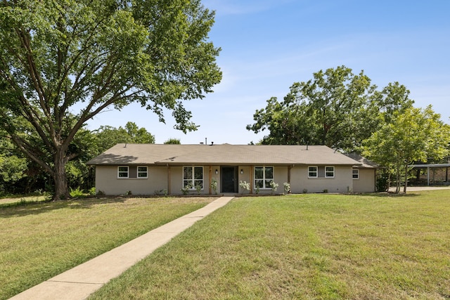 ranch-style house featuring a front yard