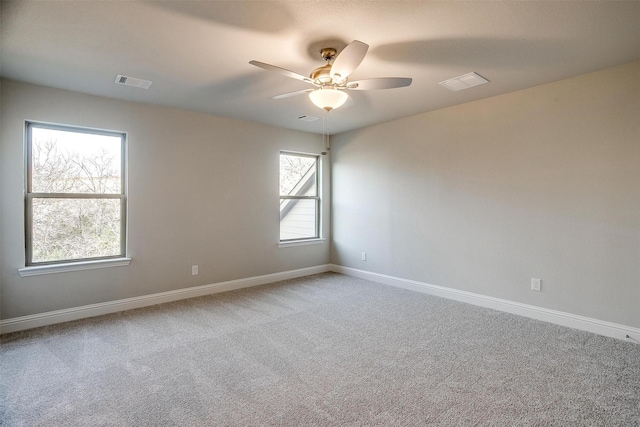 unfurnished room featuring carpet flooring and ceiling fan