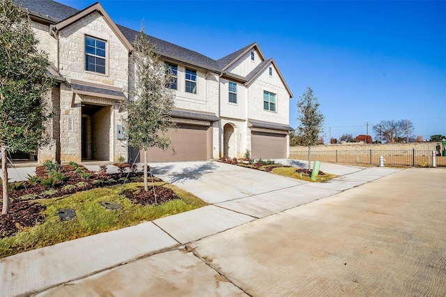 view of front of property with a garage