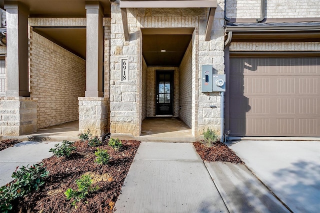 entrance to property featuring a garage