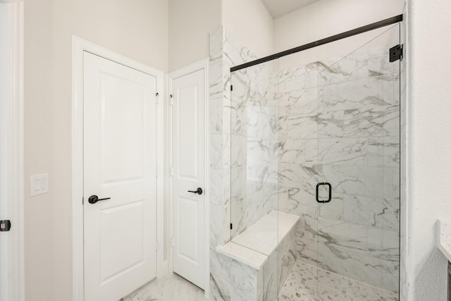 bathroom with an enclosed shower