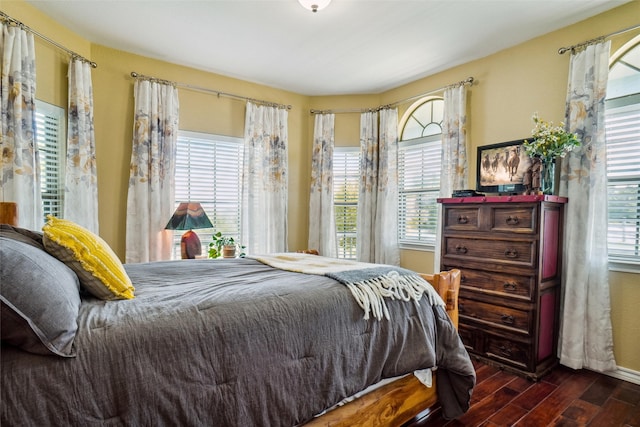 bedroom featuring dark hardwood / wood-style flooring