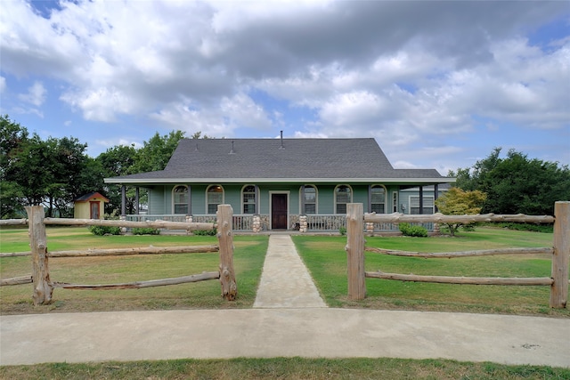 view of front facade with a porch and a front lawn