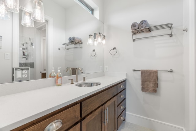 bathroom with vanity, a shower, and tile patterned floors