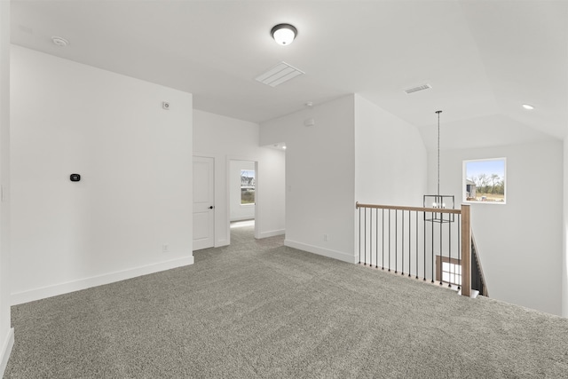 3104 Summer Rain Ln, Anna, TX 75409 - carpeted empty room with vaulted ceiling and a chandelier