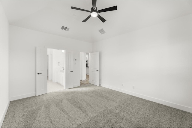 3104 Summer Rain Ln, Anna, TX 75409 - unfurnished bedroom with light carpet, a ceiling fan, connected bathroom, and vaulted ceiling