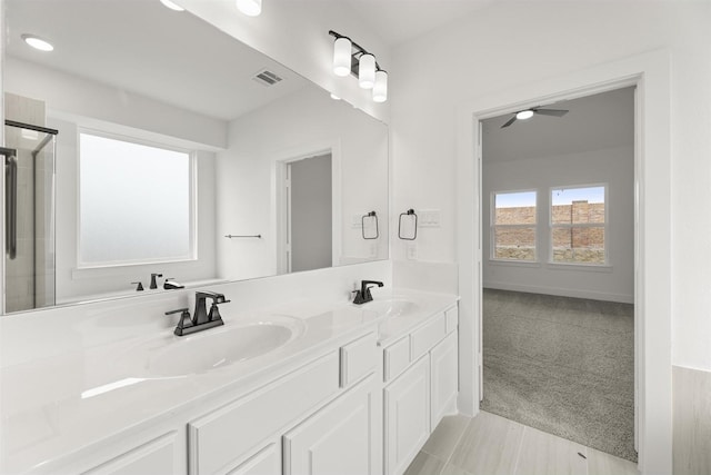 3104 Summer Rain Ln, Anna, TX 75409 - full bath featuring double vanity, a shower with shower door, and a ceiling fan