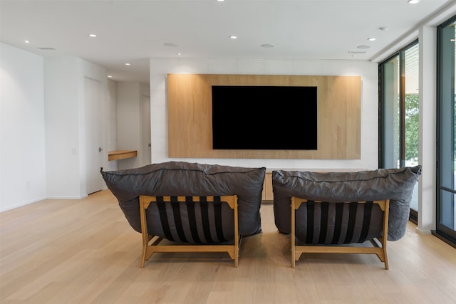 sitting room with light hardwood / wood-style floors