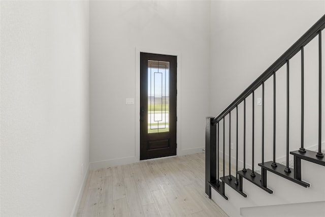 foyer with light wood-type flooring