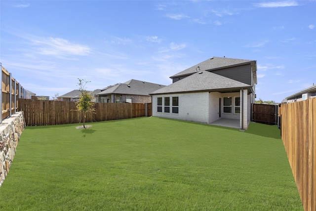 view of yard with a patio area