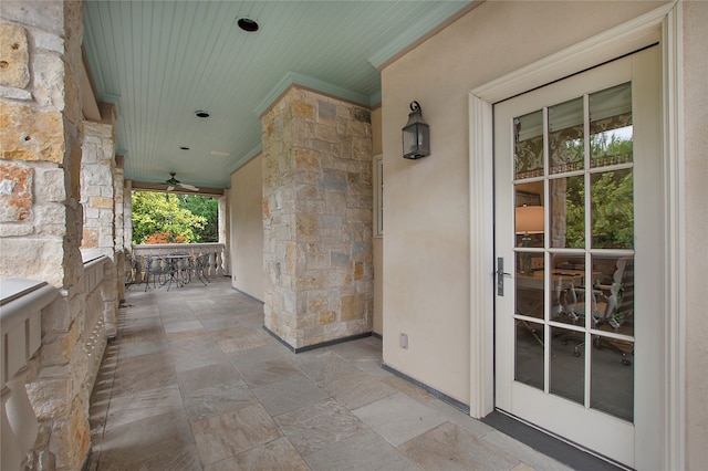 view of patio featuring ceiling fan