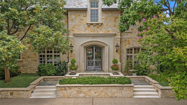 entrance to property featuring french doors