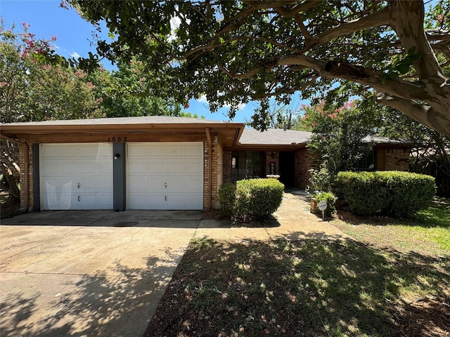 ranch-style home with a garage