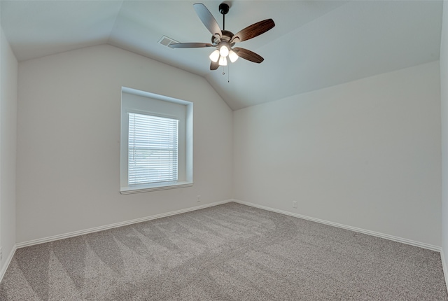 additional living space featuring lofted ceiling, light colored carpet, and ceiling fan