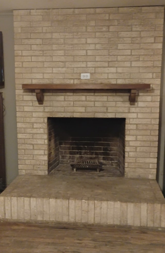 308 County Road 1296, Morgan, TX 76671 - detailed view of a fireplace and wood finished floors