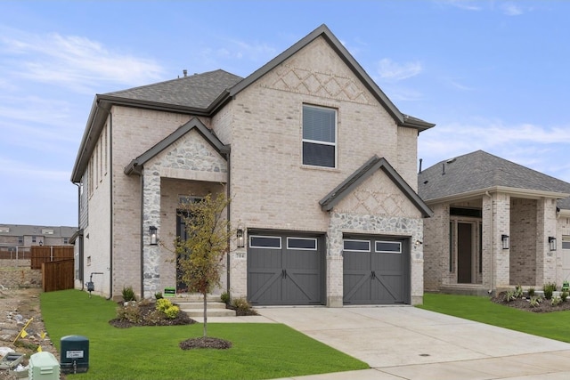 french country style house with a garage and a front lawn