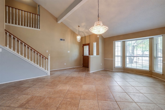 unfurnished room with light tile patterned flooring, high vaulted ceiling, a notable chandelier, and beam ceiling