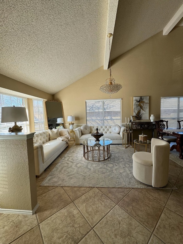 tiled living room featuring lofted ceiling with beams and a textured ceiling