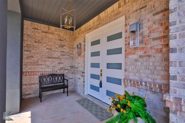 property entrance with french doors and a porch