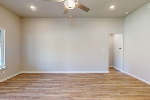 unfurnished room with light hardwood / wood-style floors and ceiling fan