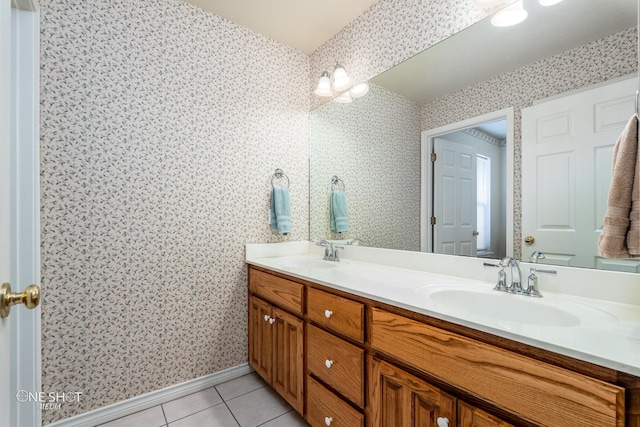 bathroom featuring tile patterned floors and double vanity