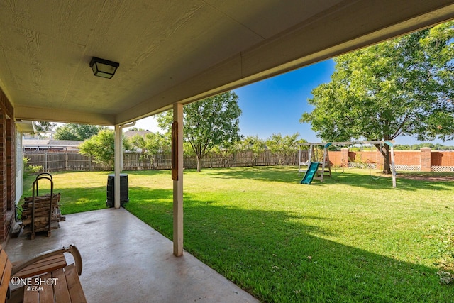 view of patio with a playground