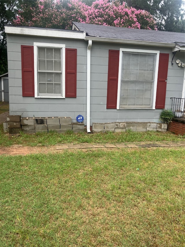 exterior space with a front yard