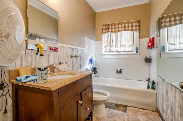 bathroom featuring toilet, vanity, and crown molding