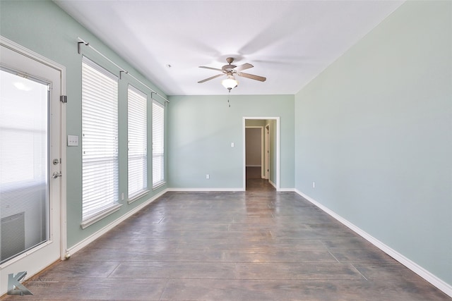 spare room with ceiling fan and hardwood / wood-style floors