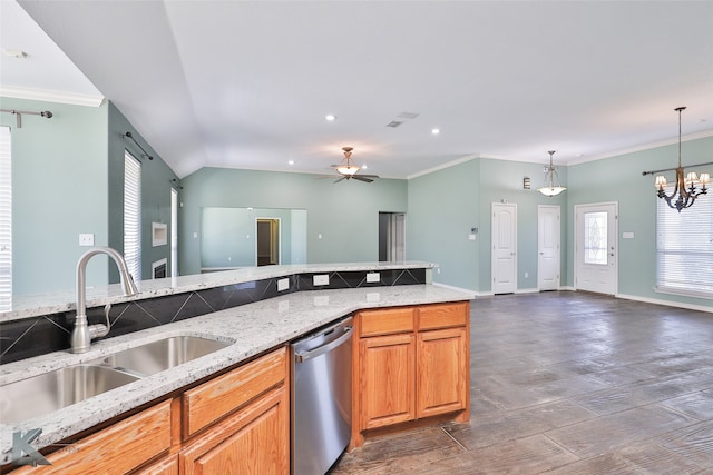 kitchen with ceiling fan with notable chandelier, pendant lighting, sink, dishwasher, and light stone counters