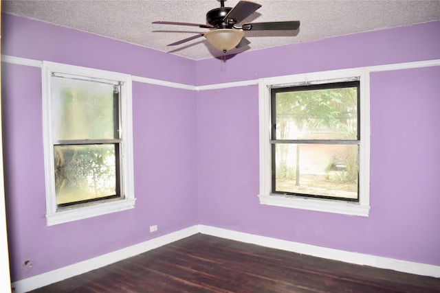 empty room featuring a textured ceiling, hardwood / wood-style flooring, and ceiling fan