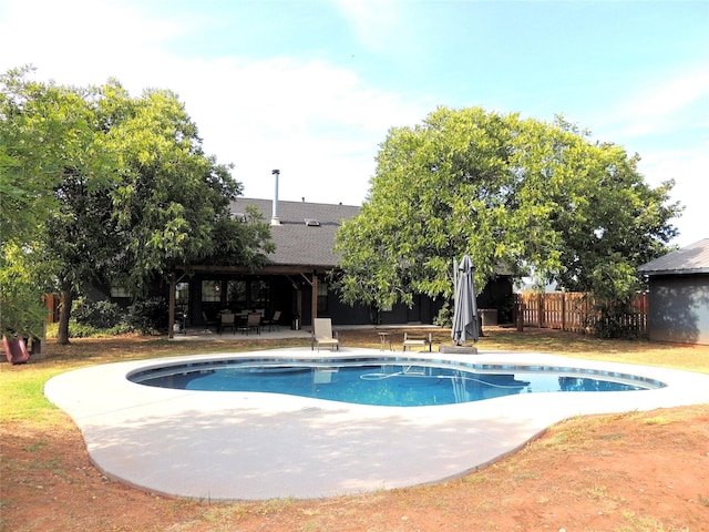 view of swimming pool featuring a patio area