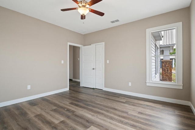 interior space featuring hardwood / wood-style flooring and ceiling fan