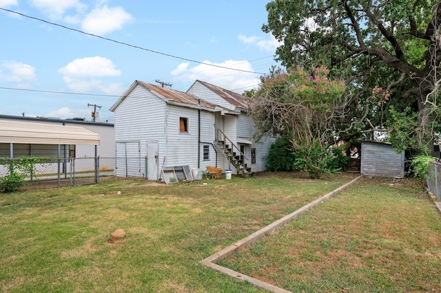 exterior space with a storage unit and a yard