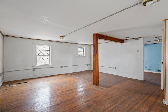 basement featuring wood-type flooring