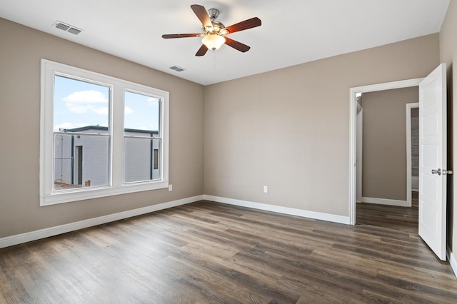 unfurnished room with hardwood / wood-style floors and ceiling fan