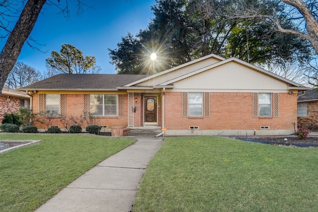 ranch-style house with a front yard