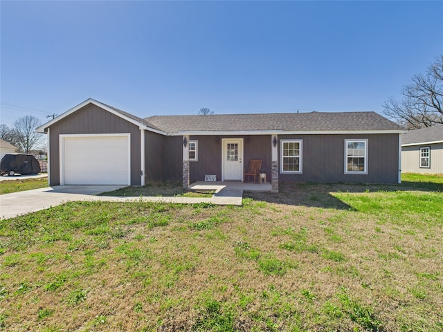 ranch-style home featuring driveway, a front lawn, and a garage