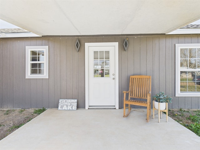 entrance to property featuring a patio area