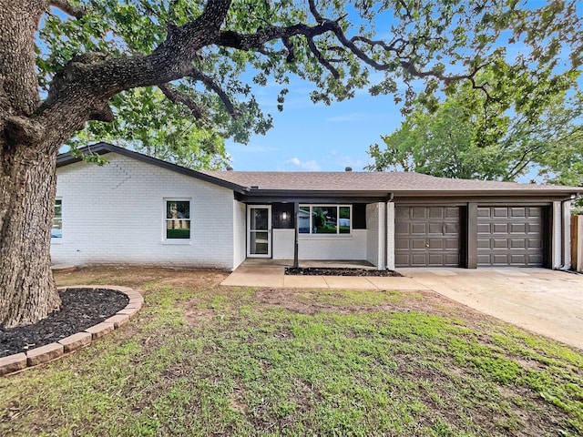 845 Dianna Ave, Hurst, TX 76053 - ranch-style home featuring an attached garage and driveway