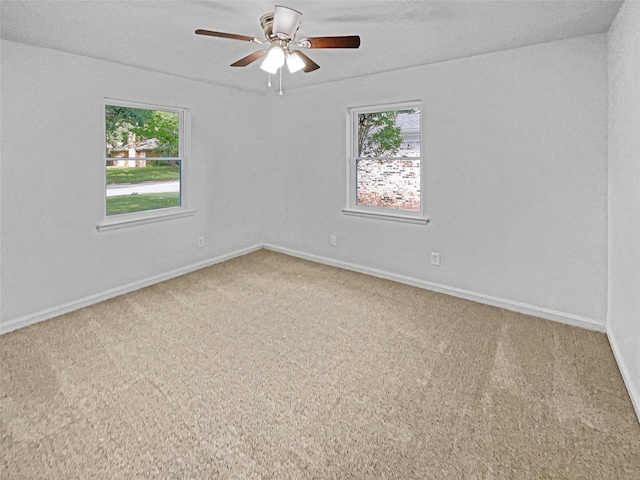 845 Dianna Ave, Hurst, TX 76053 - unfurnished bedroom with baseboards, dark wood-style floors, ensuite bathroom, and a ceiling fan