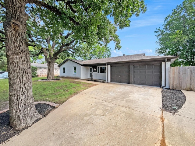845 Dianna Ave, Hurst, TX 76053 - single story home featuring an attached garage, concrete driveway, brick siding, and roof with shingles