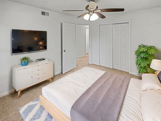 845 Dianna Ave, Hurst, TX 76053 - bedroom with baseboards, a ceiling fan, light colored carpet, and a closet